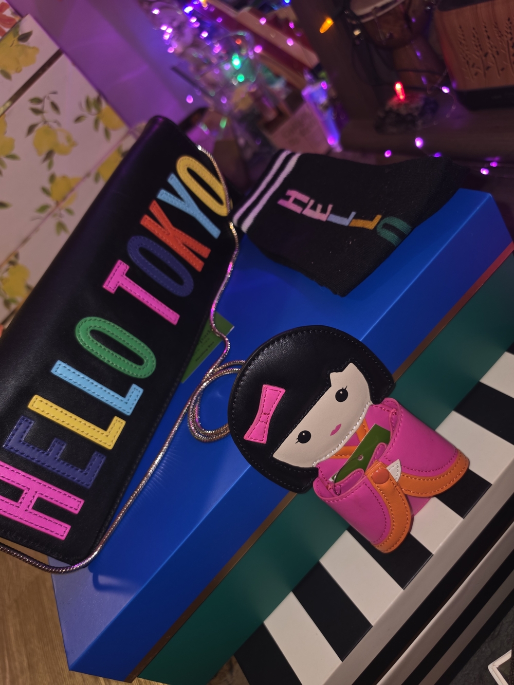 kate spade black "Hello Tokyo" multicolor leather clutch with pink doll charm